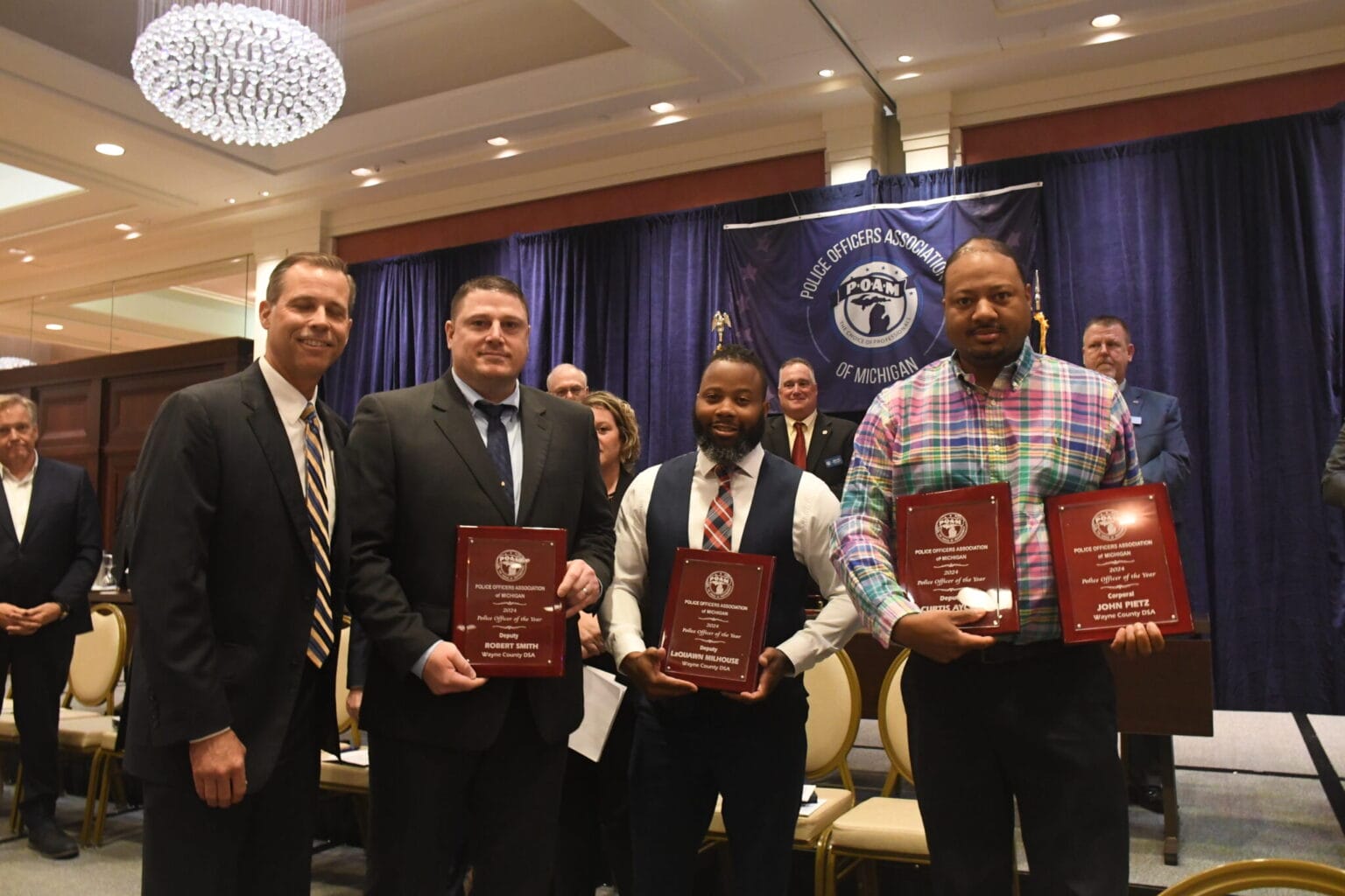 Judge George Mertz presented Wayne County Deputy Sheriff Association's Deputies Curtis Aycox, Robert Smith, & LaQuawn Milhouse and Corporal John Pietz with the 2024 Police Officers of the Year Awards.